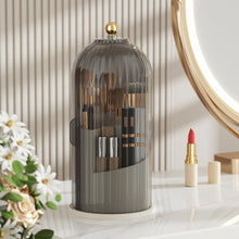 Laden Sie das Bild in den Galerie-Viewer, Stylish MessFree® makeup brush holder with tinted dome cover and gold knob on vanity table, ideal for organizing brushes and cosmetics, complemented by flower arrangement and lipstick accessory