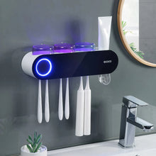 Laden Sie das Bild in den Galerie-Viewer, Ecoco wall-mounted toothbrush holder with toothpaste dispenser and storage