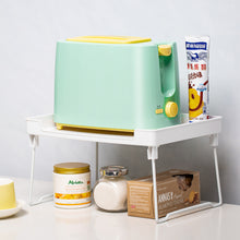 Load image into Gallery viewer, Shelf riser holding a toaster