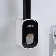 Laden Sie das Bild in den Galerie-Viewer, Close-up of black toothpaste dispenser