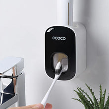 Laden Sie das Bild in den Galerie-Viewer, Dispensing toothpaste onto a brush