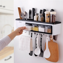 Load image into Gallery viewer, Wall spice rack with knives, jars and hanging utensils