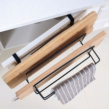 Laden Sie das Bild in den Galerie-Viewer, Overhead view of a mounted kitchen rack holding a wooden cutting board and a roll of parchment or foil, with a striped kitchen towel hanging from the lower bar.