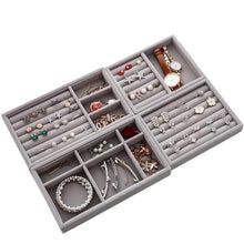 Load image into Gallery viewer, Elegant jewelry organizer trays with multiple compartments for storing rings, earrings, bracelets, necklaces, and watches. Designed in a soft gray velvet material, these stackable trays keep your accessories neatly displayed and protected, ideal for home use or retail display. Perfect for decluttering your jewelry collection with a luxurious touch.