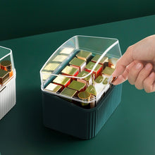 Load image into Gallery viewer, Opening the clear lid of a green lipstick organizer