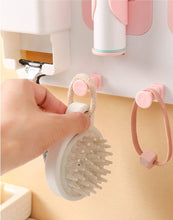 Laden Sie das Bild in den Galerie-Viewer, Hooks holding a hairbrush