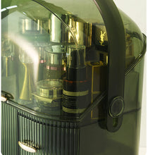Laden Sie das Bild in den Galerie-Viewer, Close-up of dark green vanity box with cosmetics