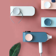 Laden Sie das Bild in den Galerie-Viewer, Hair dryer holders on a pink wall