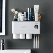 Laden Sie das Bild in den Galerie-Viewer, Grey wall-mounted toothbrush holder with 3 cups and toothpaste dispenser