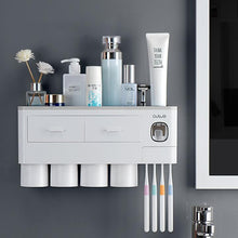 Laden Sie das Bild in den Galerie-Viewer, Grey wall-mounted toothbrush holder with 4 cups and toothpaste dispenser