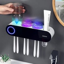 Laden Sie das Bild in den Galerie-Viewer, Ecoco wall-mounted toothbrush holder with toothpaste dispenser and storage
