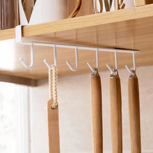 Load image into Gallery viewer, MessFree® white under-cabinet hooks rack holding kitchen utensils with wooden handles, efficiently maximizing kitchen storage space.
