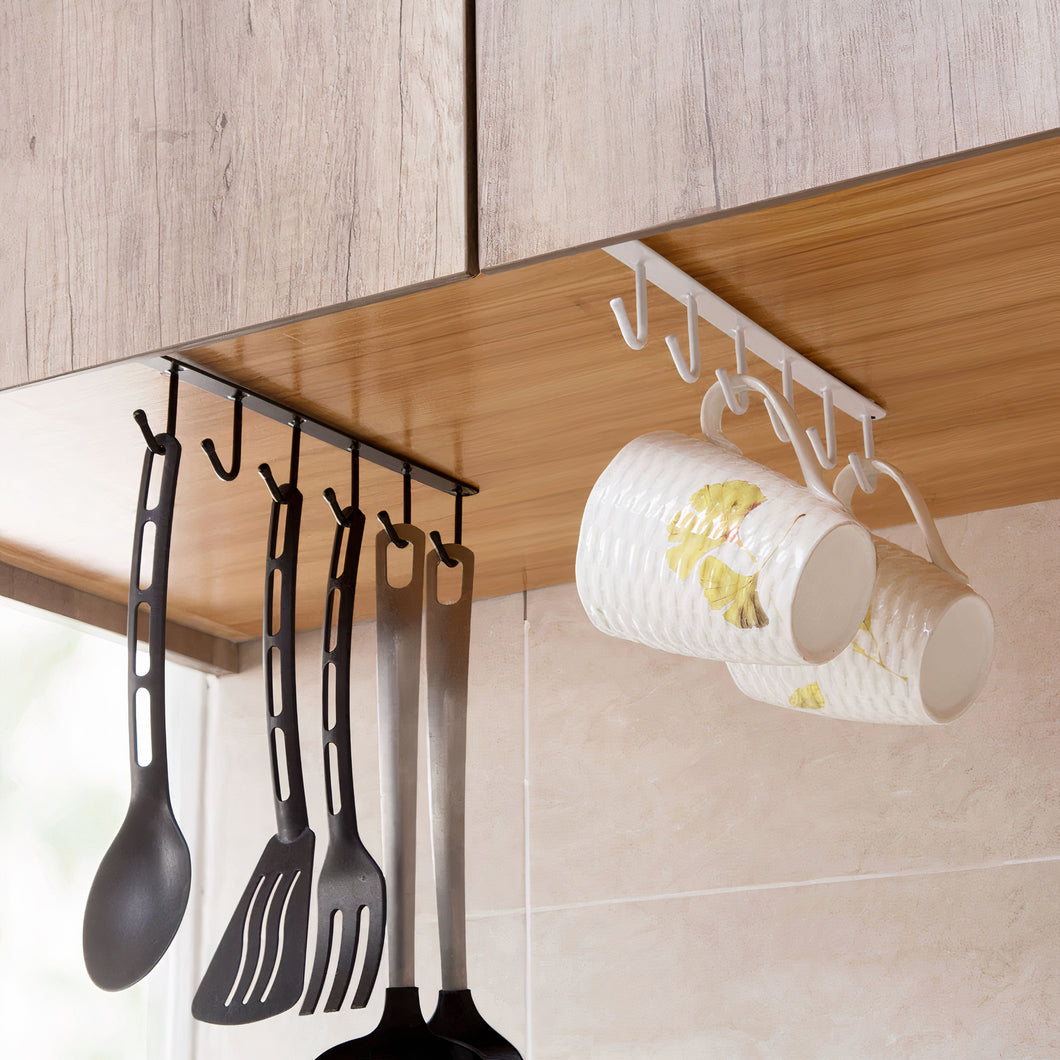 MessFree® under-cabinet hooks hanging rack installed on a kitchen cabinet, with black and white hooks holding various kitchen utensils and cups for organized storage.