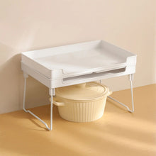 Load image into Gallery viewer, Shelf riser over a cooking pot
