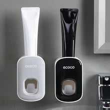 Laden Sie das Bild in den Galerie-Viewer, Grey and black dispensers with toothpaste

