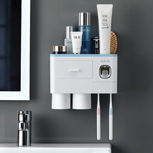 Load image into Gallery viewer, Wall-mounted toothbrush holder with toothpaste dispenser and storage
