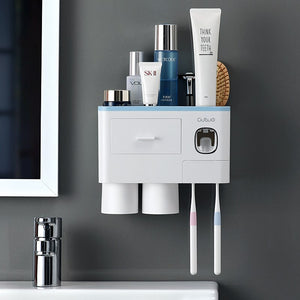 Wall-mounted toothbrush holder with toothpaste dispenser and storage