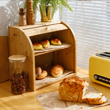 Load image into Gallery viewer, Bamboo double layer bread box with bread on a counter
