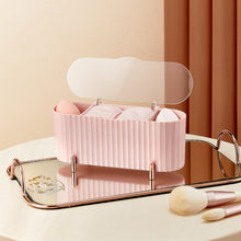 Load image into Gallery viewer, Pink storage box with lid open on a vanity tray
