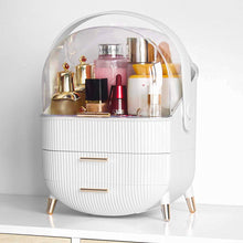 Laden Sie das Bild in den Galerie-Viewer, White makeup organizer filled with perfumes and skincare
