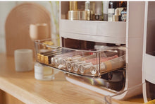 Load image into Gallery viewer, Makeup organizer with open drawer on a dresser
