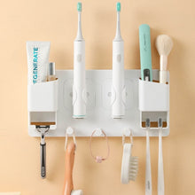 Laden Sie das Bild in den Galerie-Viewer, Wall rack holding electric toothbrushes
