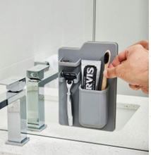 Load image into Gallery viewer, Grey silicone holder above a sink
