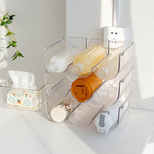 Load image into Gallery viewer, Stackable clear bottle rack with bottles on a counter
