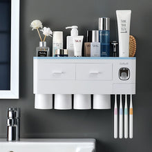 Laden Sie das Bild in den Galerie-Viewer, Blue wall-mounted toothbrush holder with 4 cups and toothpaste dispenser
