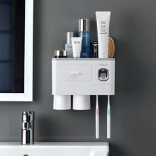 Laden Sie das Bild in den Galerie-Viewer, Grey wall-mounted toothbrush holder with 2 cups and toothpaste dispenser
